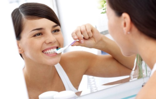 khắc phục hôi miệng sau khi nhổ răng khôn
