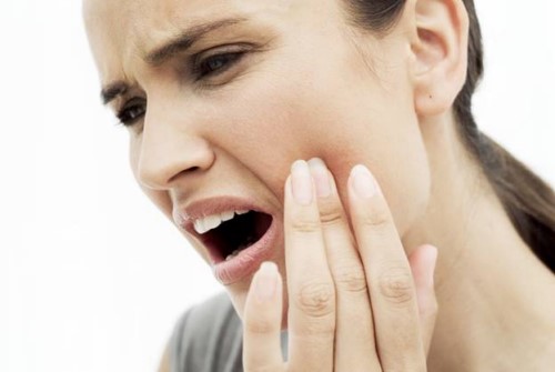 đau nhức khi mọc răng khôn