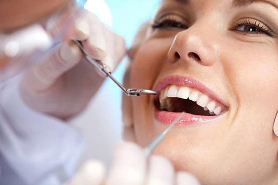 Lấy vôi răng và thăm khám nha khoa định kỳ