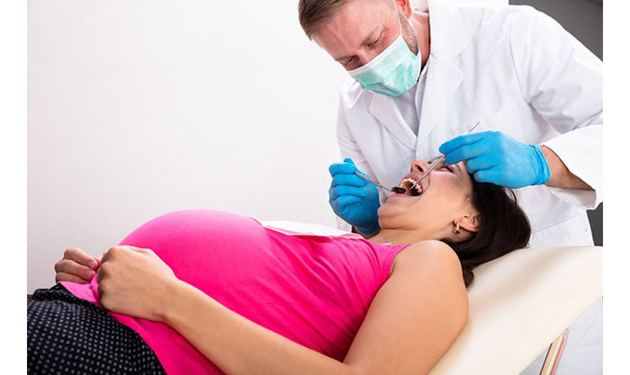 Không nhổ răng khi đang mang thai để tránh tác hại nguy hiểm cho mẹ và bé